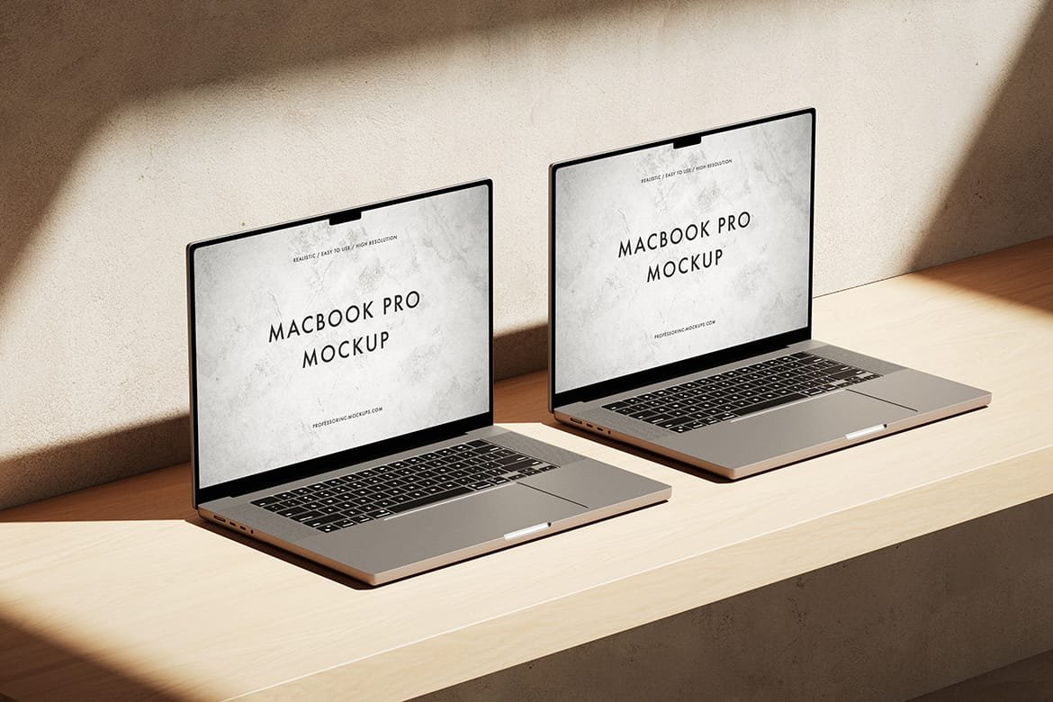 Two Apple MacBooks on the desk mockup